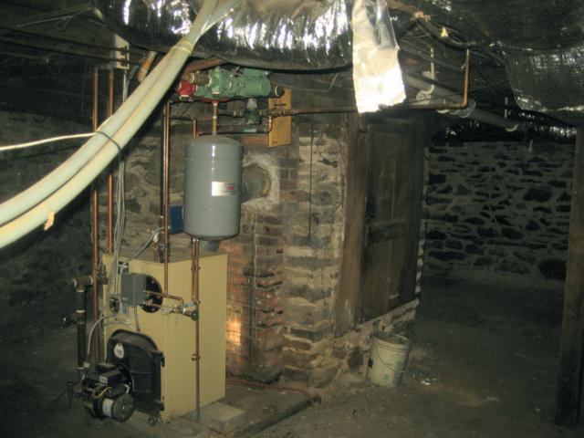 21Chimney base in back cellar with door in it 10-20-14.jpg